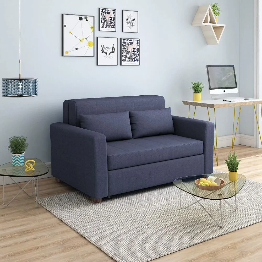 Denim Blue Modern red pull-out sofa bed (two-seater) in a contemporary room.