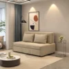 Bambillo Bella Armless Sofa Bed in beige fabric colour, showing sofa position with headrest in sofa position