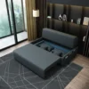 Bambillo Citta Armless Sofa Bed With Headboard in charcoal fabric colour, showing seat pulled out to show hidden storage under seat and headrest in sofa position