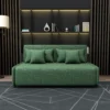 Bambillo Citta Armless Sofa Bed With Headboard in forest green fabric colour, showing sofa configuration with four matching cushions