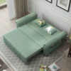 Bambillo Roma Sofa Bed with rolled arms in sage fabric colour, showing bed configuration with headrest folded down