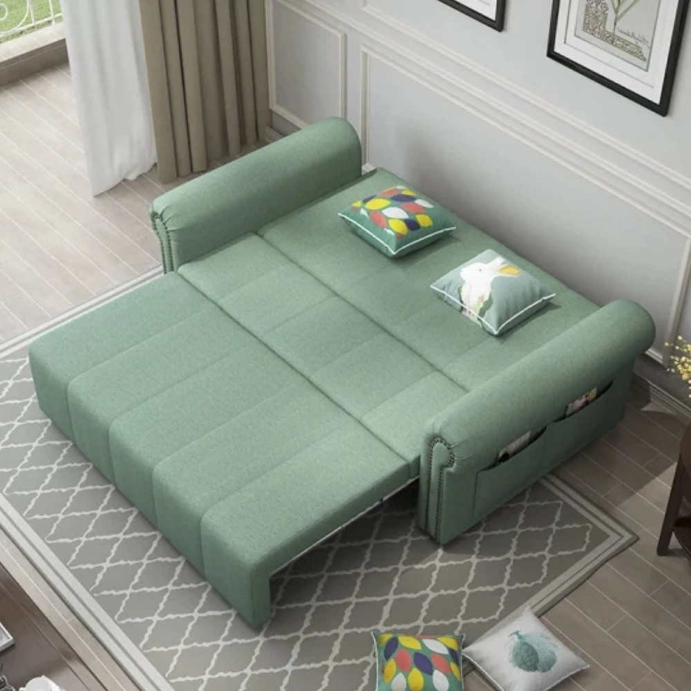 Bambillo Roma Sofa Bed with rolled arms in sage fabric colour, showing bed configuration with headrest folded down