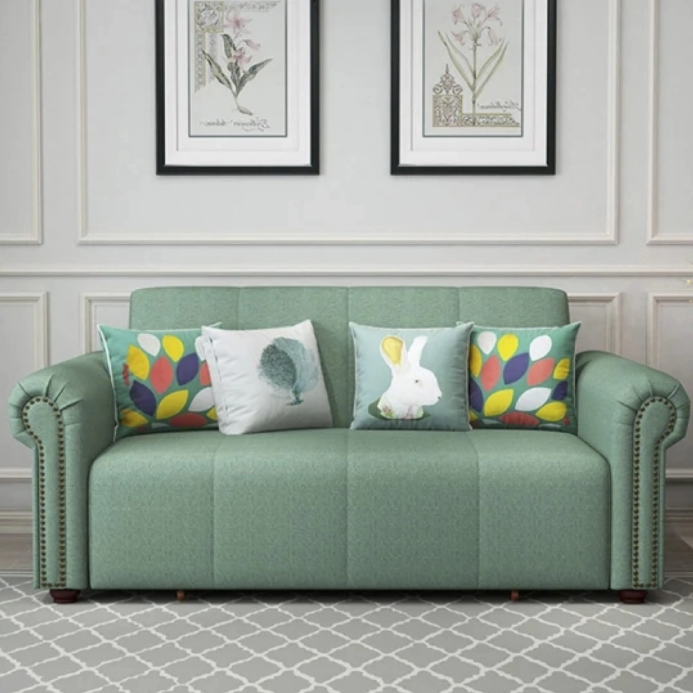 Bambillo Roma Sofa Bed with rolled arms in sage fabric colour, direct front facing showing sofa configuration and with decorative pillows