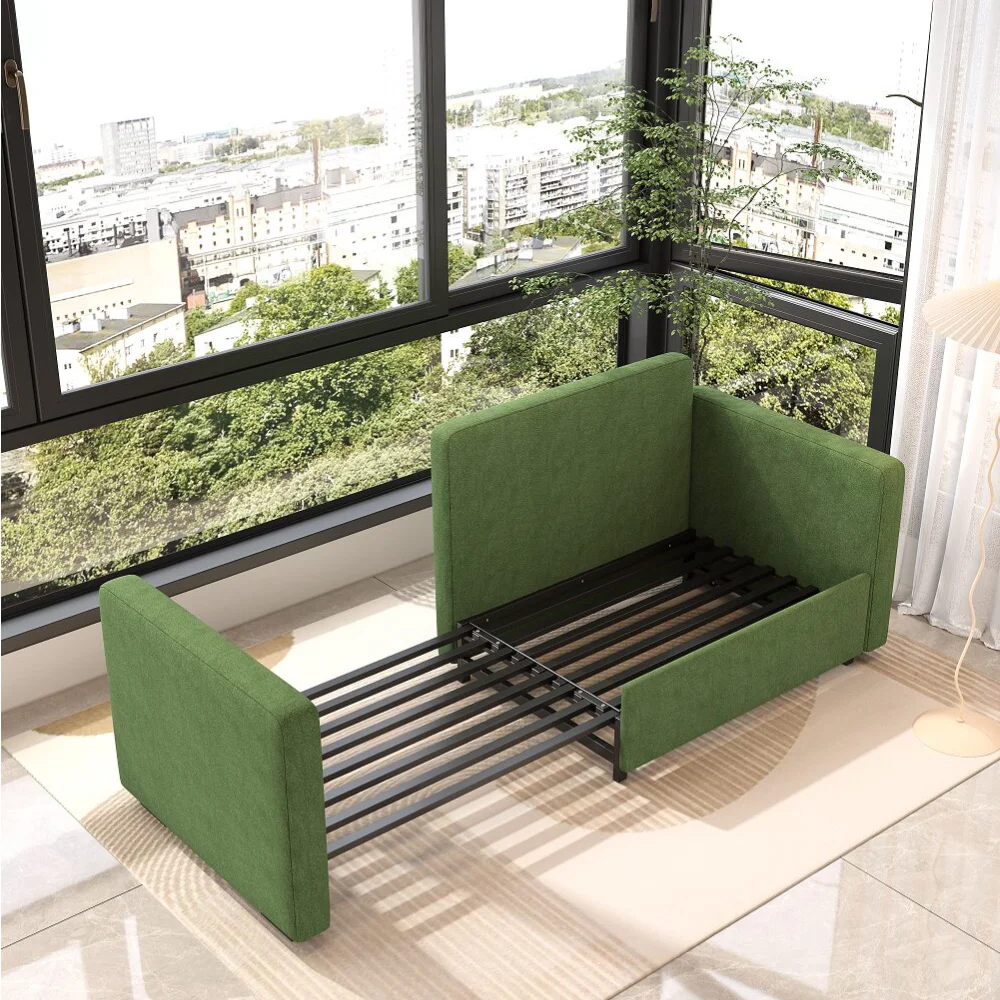 Bambillo Siena Sofa Bed in leaf green fabric, showing right arm pulled out to make bed configuration, frame showing with no seat cushion