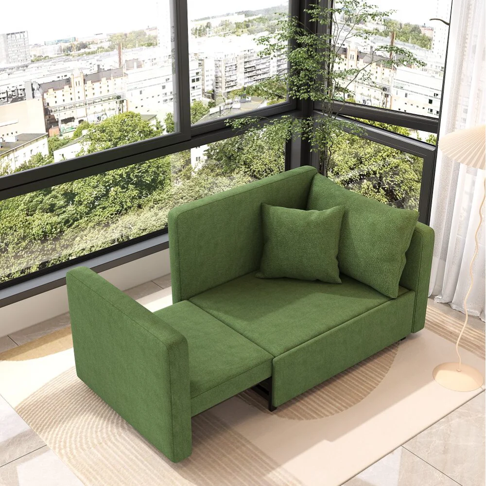Bambillo Siena Sofa Bed in leaf green fabric, showing right arm pulled out to make bed configuration and seat cushion folded out